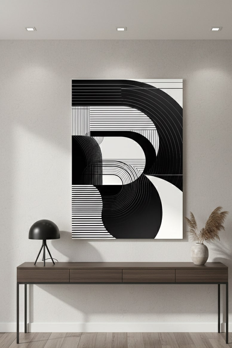 Tableau abstrait noir et blanc minimaliste intégré dans un intérieur contemporain
