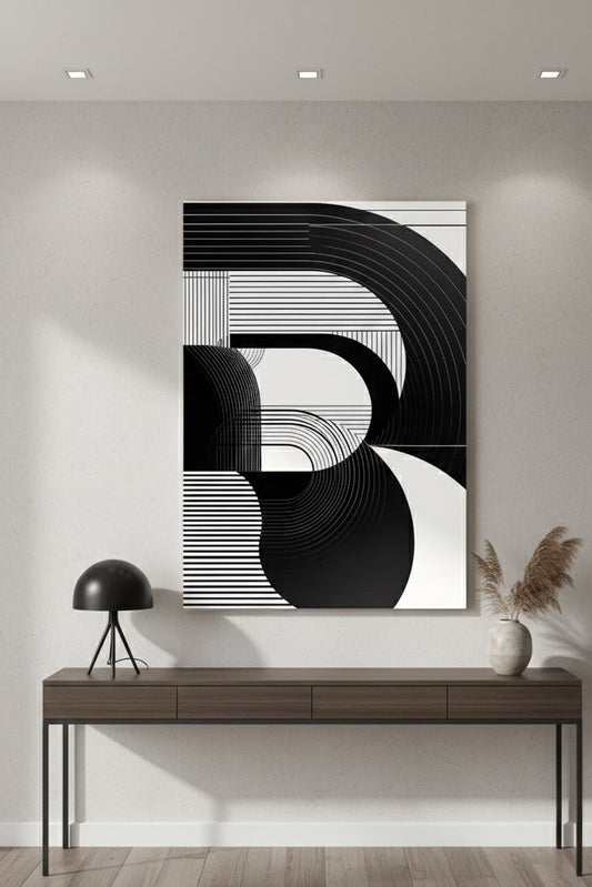 Tableau abstrait noir et blanc minimaliste intégré dans un intérieur contemporain
