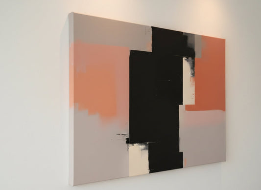 Vue de profil du tableau minimaliste sur toile aux aplats noir et terracotta
